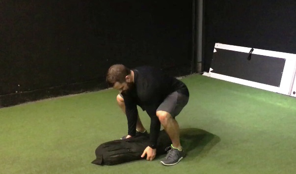 Sandbag Shouldering Return