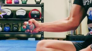 Tennis Ball Squeeze: How to Do And Form